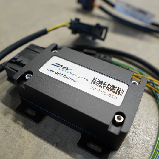 Steuermodul des OPF-Delete-Moduls mit MX-Motorsports-Etikett und Kabelanschlüssen
